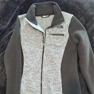 North face womens gray and black ribbed zip up jacket. Size Medium